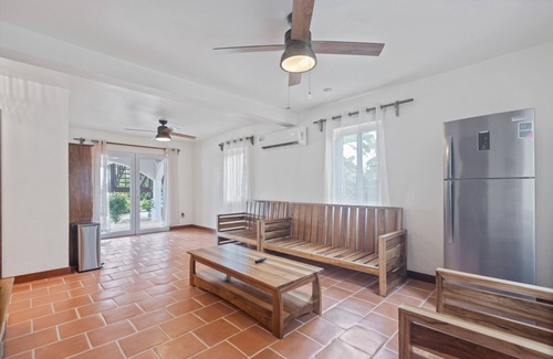 Caribbean Way House | Beachfront home with dock, deck, hammocks, strong WiFi, AC & sea view
