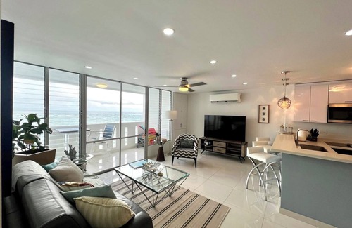 San Juan Apartment | Beachfront Oceanview 1-bedroom condo with balcony, parking, wifi, AC