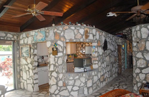 Old Bight House | Beachfront views of pristine sandy beach, clear blue waters and surreal sunsets.