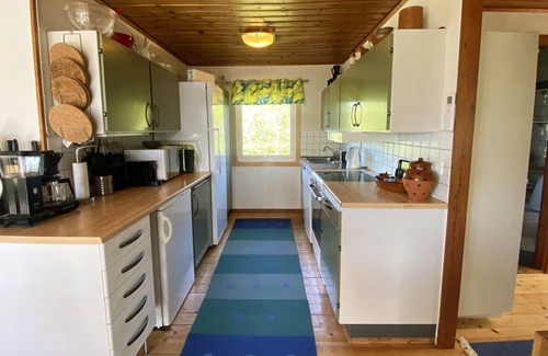 Lervik House | Beachside holiday home with large lovely garden | SE01054
