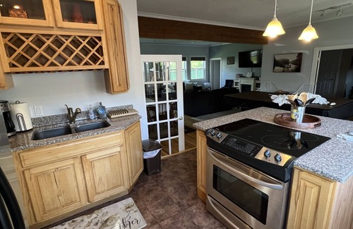 Pittsfield House | Beautiful 8 Bedroom, Walk to Lake, Jetted Hot Tub, Fireplace, & Pool Table