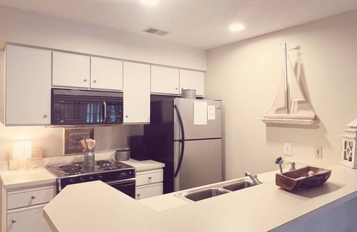 Sea Trail House | Beautiful and spacious first floor Sunset Beach villa in Sea Trail! Bikes & gear
