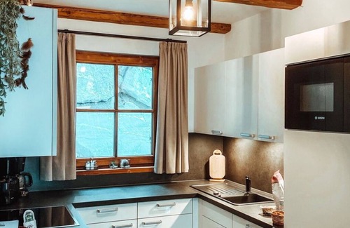 Pfarrwerfen House | Beautiful apartment in villa for 6 people with WIFI, TV, terrace, pets allowed and parking