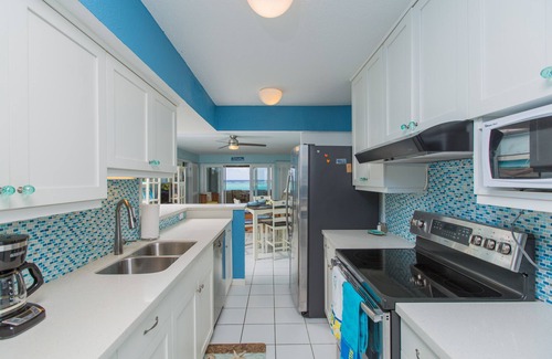 Estate Golden Rock Condo | Beautiful condo ON THE BEACH. Enjoy amazing views and the cool ocean breeze.