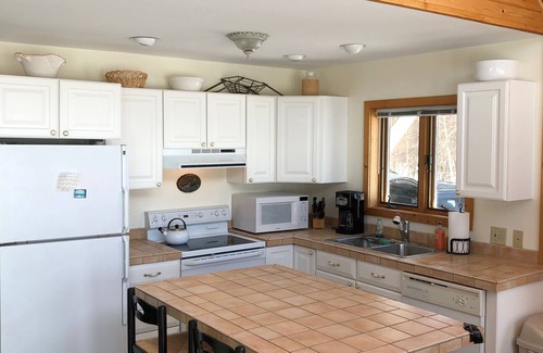 Hessel House | Beautiful Cottage on St. Martins Bay, Lake Huron, with Pontoon, Kayaks & Canoe!