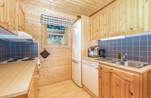 Fjaerland House | Beautiful cottages built on the fjord in Fjærland.