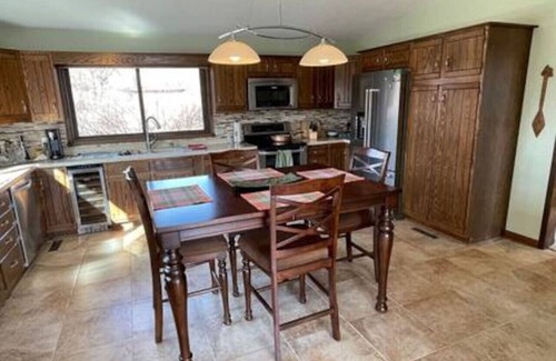 Altoona House | Beautiful Home in Town Acreage