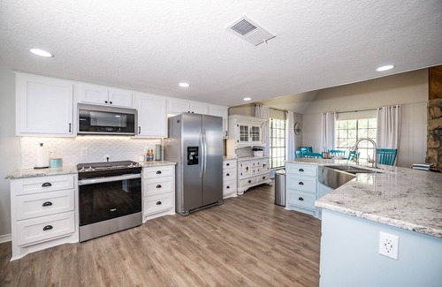 Cedar Lane House | Beautiful Home on Caney Creek w/Fishing Pier, Hot Tub, Fire Pit & Golf Cart!