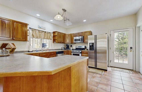 Lagoon Heights House | Beautiful home with screened porch, deck, W/D, family room, & central AC