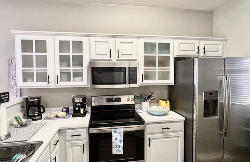 Sunset Beach Condo | Beautiful King Suite-2 BR Lake Front Golf Condo - Sandpiper Bay Golf Club