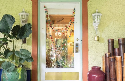 East Little Havana House | Beautiful & Large Bedroom in B&B in Exquiste Tropical Home- Centrally located