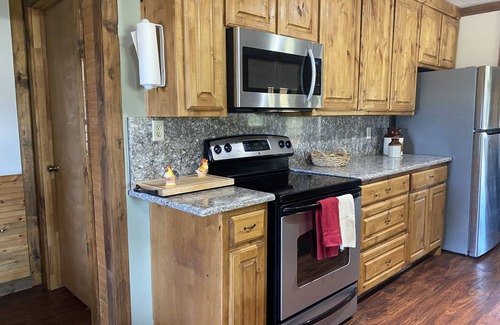 Gordonville Cabin | Beautiful log cabin with huge wrap around porches!