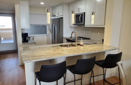 Palm Beach Condo | Beautiful Palm Beach Island with sunsets on the balcony. 90 day minimum stay.