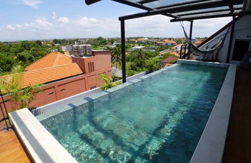Batubelig Villa | Beautiful Penthouse w/incredible views, pool, & cinema room!