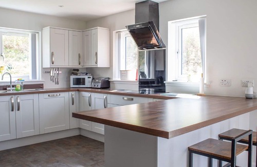 Uig House | Beautiful private villa for 10 guests with hot tub, WIFI, TV, patio, pets allowed and parking