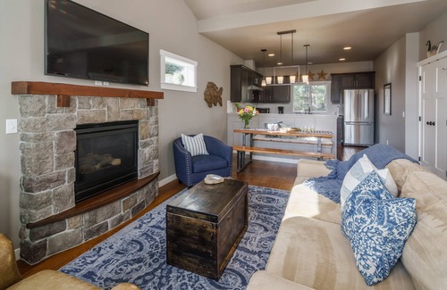 Tolovana Park House | Beautiful reverse floor plan cottage fire pit outdoor shower short walk to beach fireplace, decks