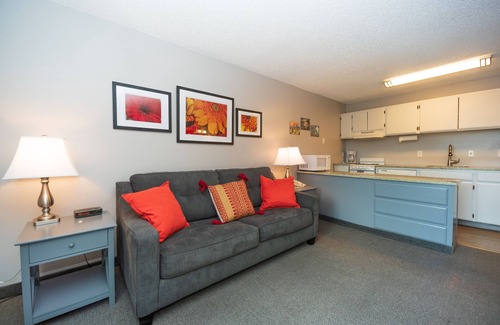 Bend Condo | Beautiful River Views - Walk Downtown ~ Fireplace ~ Patio