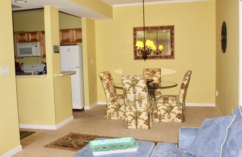 Rehoboth Beach Condo | Beautiful tranquil setting with pool or walk to the beach, shopping and dining.