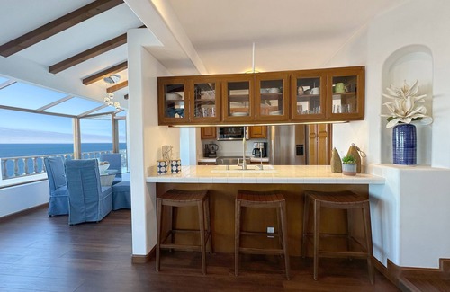 Avalon Condo | Beautifully Remodeled Premium Ocean View Condo with Fireplace and Golf Cart!