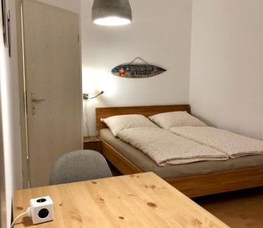 Giessen Apartment | Bed & Kitchen