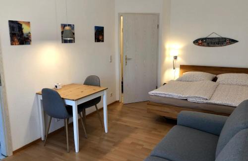 Giessen Apartment | Bed & Kitchen