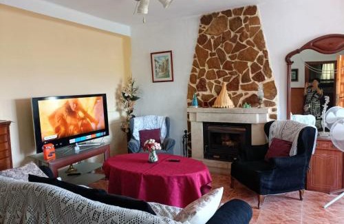 Lliria House | Bedroom with private bathroom and Two-Bedroom Family Suite in quiet forest country house 80m2 large swimming pool music town Lliria The garden and swimmingpool and garden are shared