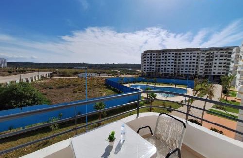 La Nouvelle Ville Ibn Batouta Apartment | Bel appartement avec piscine à deux pas de la mer