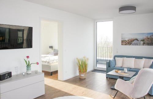 Marienleuchte Apartment | BeltBlick 29 - Moderne und barrierefreie Ferienwohnung mit Dachterrasse und Meerblick