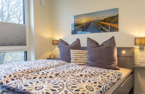 Marienleuchte Apartment | BeltBlick 29 - Moderne und barrierefreie Ferienwohnung mit Dachterrasse und Meerblick