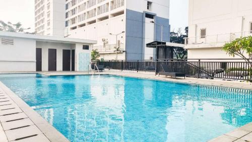 Kayu Putih Apartment | Best Price and Restful Studio at Tifolia Apartment By Travelio