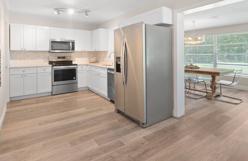 Central Naples House | Best Street! The BEACH is a 5 Min Drive plus Bikes, Firepit, & Fully Fenced Yard