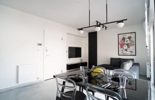 Ilisia Apartment | Black & White 2BR Apt steps from Mavili Square