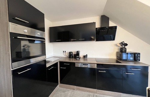 Loerrach Apartment | BlackNCozy - Design apartment with box-spring bed and balcony