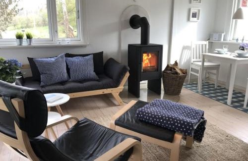 Langballigholz House | Blaue Pause - Offline-Häuschen mit Garten und Kamin