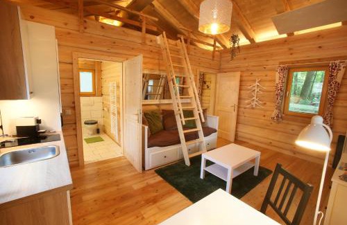 Oberschuetzen Ski Chalet | Blockhaus Chalet mit beheizbarem Badefass und Infrarotsauna auf der Terrasse
