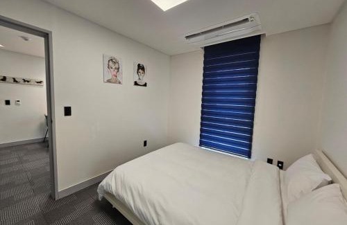 Yeongjong-dong House | Blooming House 53-201 Two-Bedroom Deluxe with Private BBQ Area