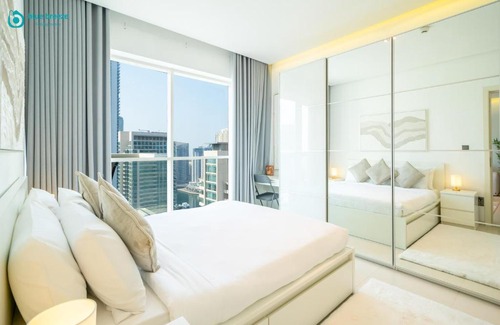 Bur Dubai Apartment | Blue Breeze - Modern Apt with Partial Marina Views & Balcony