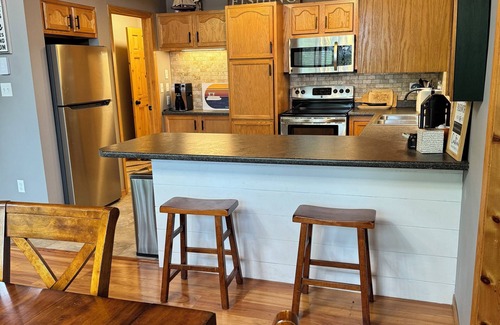 Minong House | Blue Chair Bay offers a 234' sandy beach on Minong Flowage w/impeccable views!