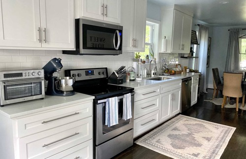 Forest Park House | Blue Door: Walk to Avondale, Dog-Friendly w Yard