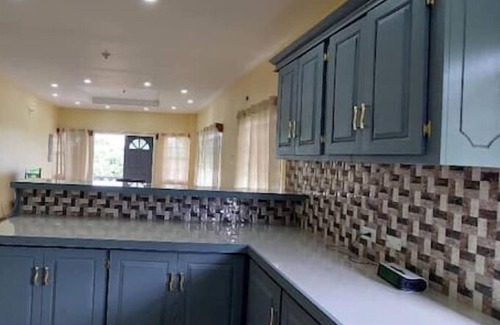 Buccoo Apartment | Blue Heron Place: Large Home Style Rental Unit:5 Minute Drive To Popular Beaches