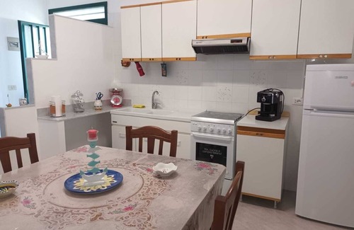 Punta Braccetto Apartment | Blue Sea Apartment, cozy apartment a few meters from the sea.