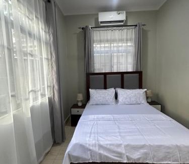 Msasani House | Blue wave loft private room