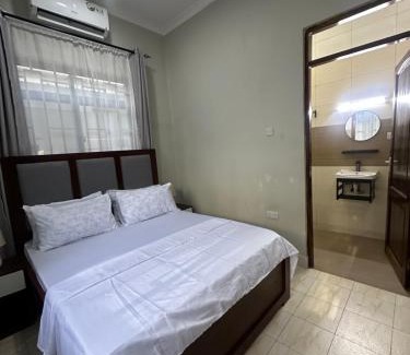 Msasani House | Blue wave loft private room