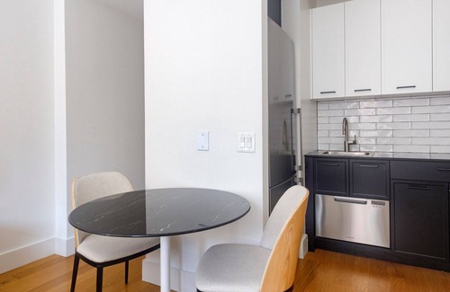 Financial District Apartment | Blueground | Financial District, rooftop, nr Wall St.