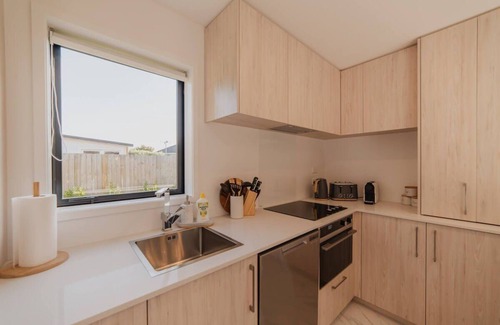 Upper Riccarton House | Bohemian Bliss in Mohua Lane: Your 4BR Haven