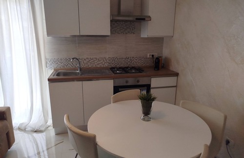 Calatabiano Apartment | Bouganville Residence - Family suite with swimming pool, tennis court, playground.