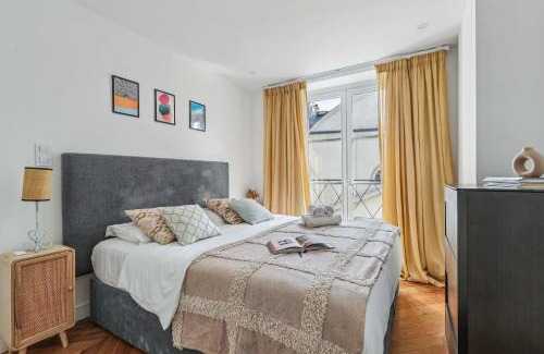 Saint-Thomas-d'Aquin Apartment | Boulevard Saint-Germain & Orsay Museum - 1BR - Paris Vacation Rental