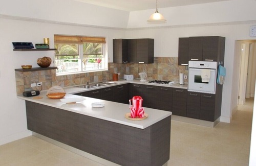 Belair Villa | 'Bout Time. Lovely villa with pool and close to beach