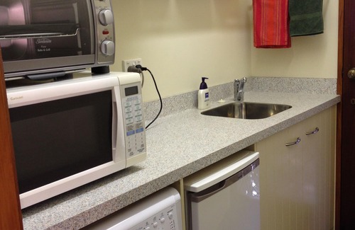 Orewa Apartment | Boutique holiday accommodation adjoining beach.