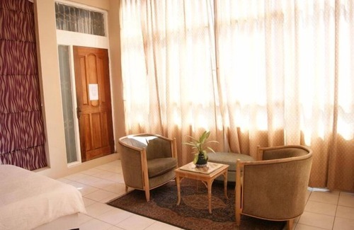 Downtown Kota Kinabalu House | Brahminy Kite Holiday Home